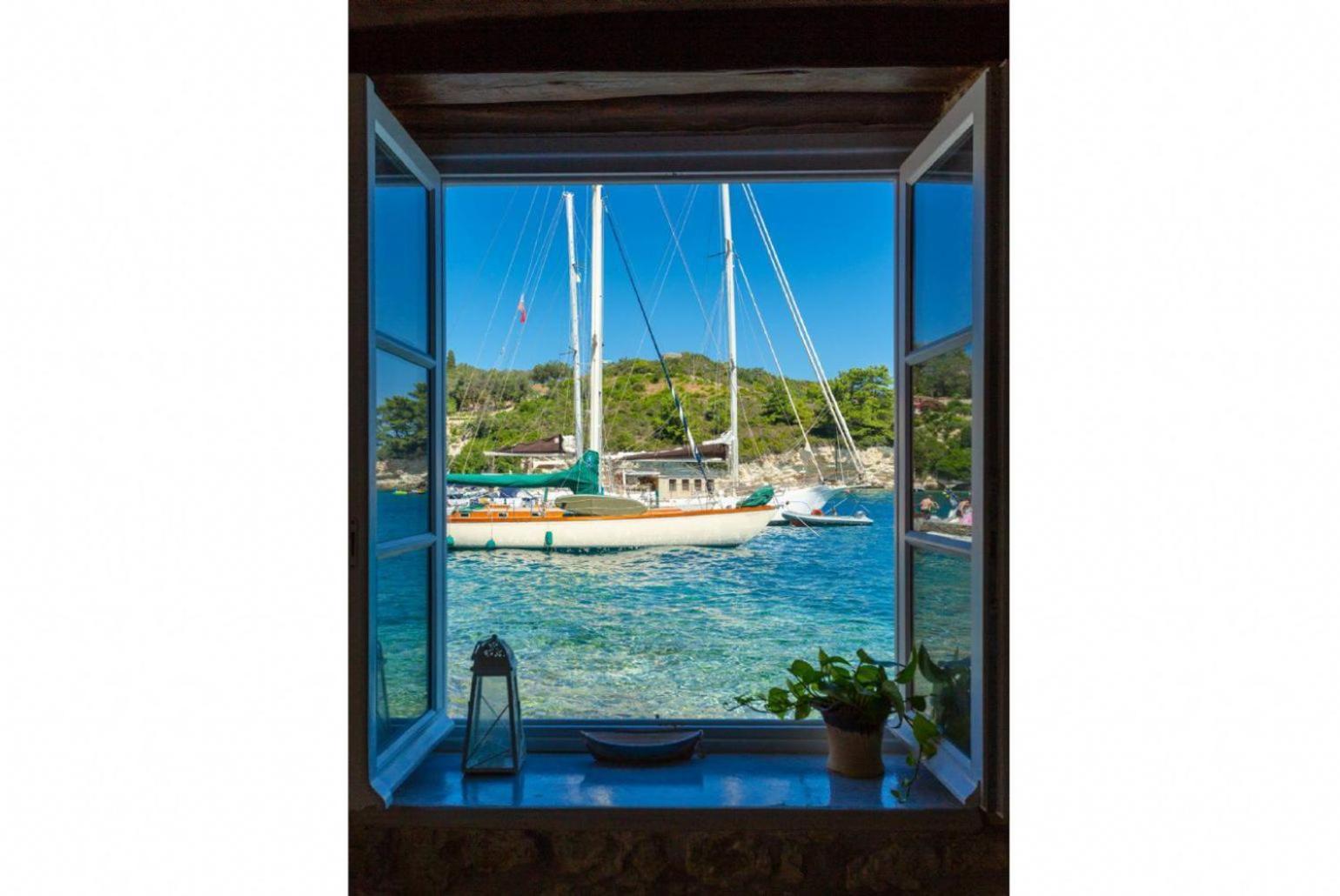 Spiros Jetty House Leilighet Longós Eksteriør bilde